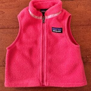 Patagonia Baby Synchilla fleece vest in a vibrant pink